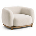 Fauteuil une place en tissu bouclé écru avec base en bois brun, 110 × 95 × 75 cm